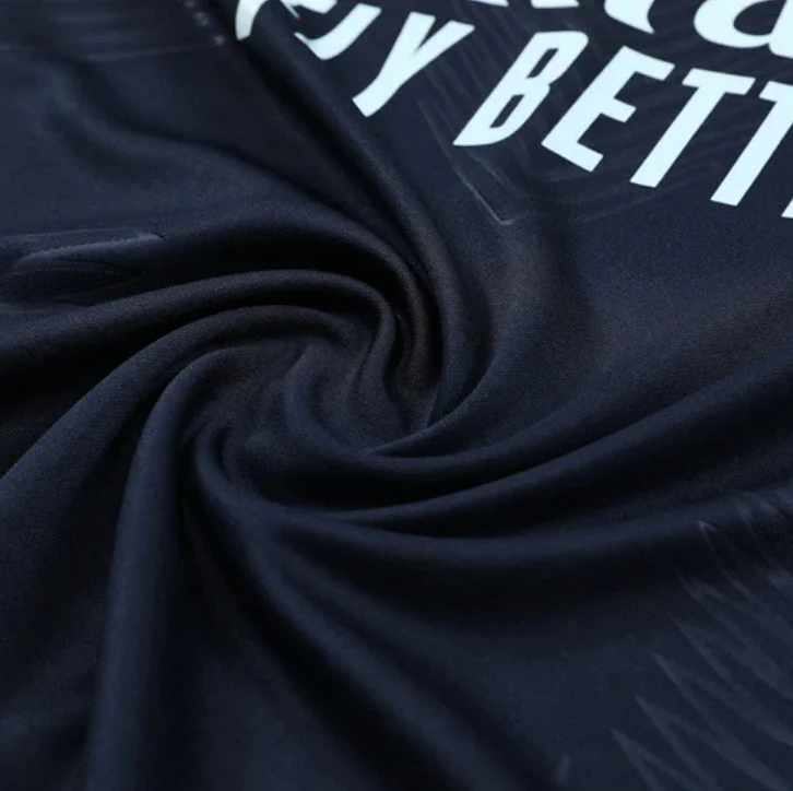 Real Madrid Dark Blue and Orange Tracksuit - Image 3