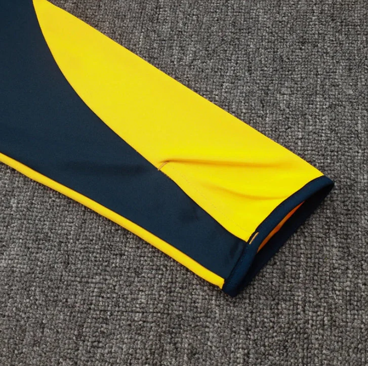 Real Madrid Dark Blue and Yellow Tracksuit - Image 5